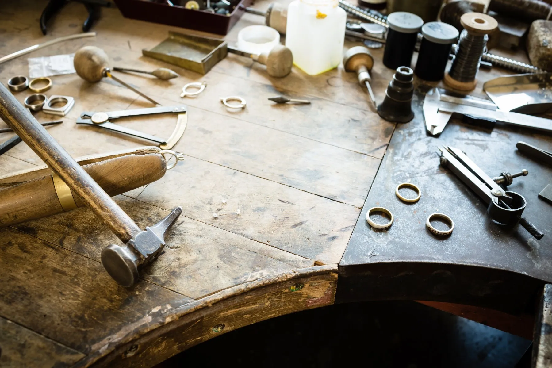Rings and hand tools on a bench peg