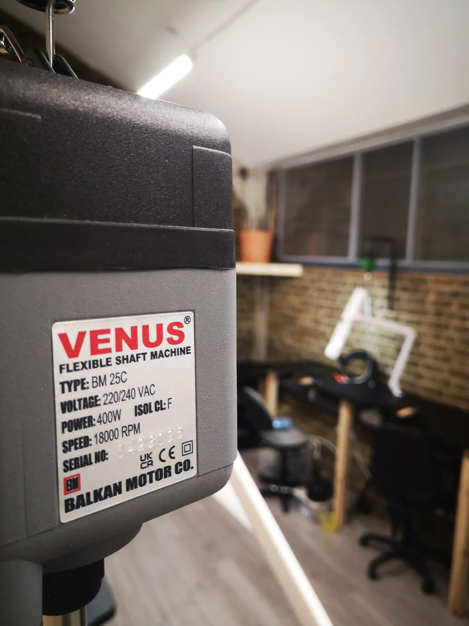 A pendant drill motor at the bench
