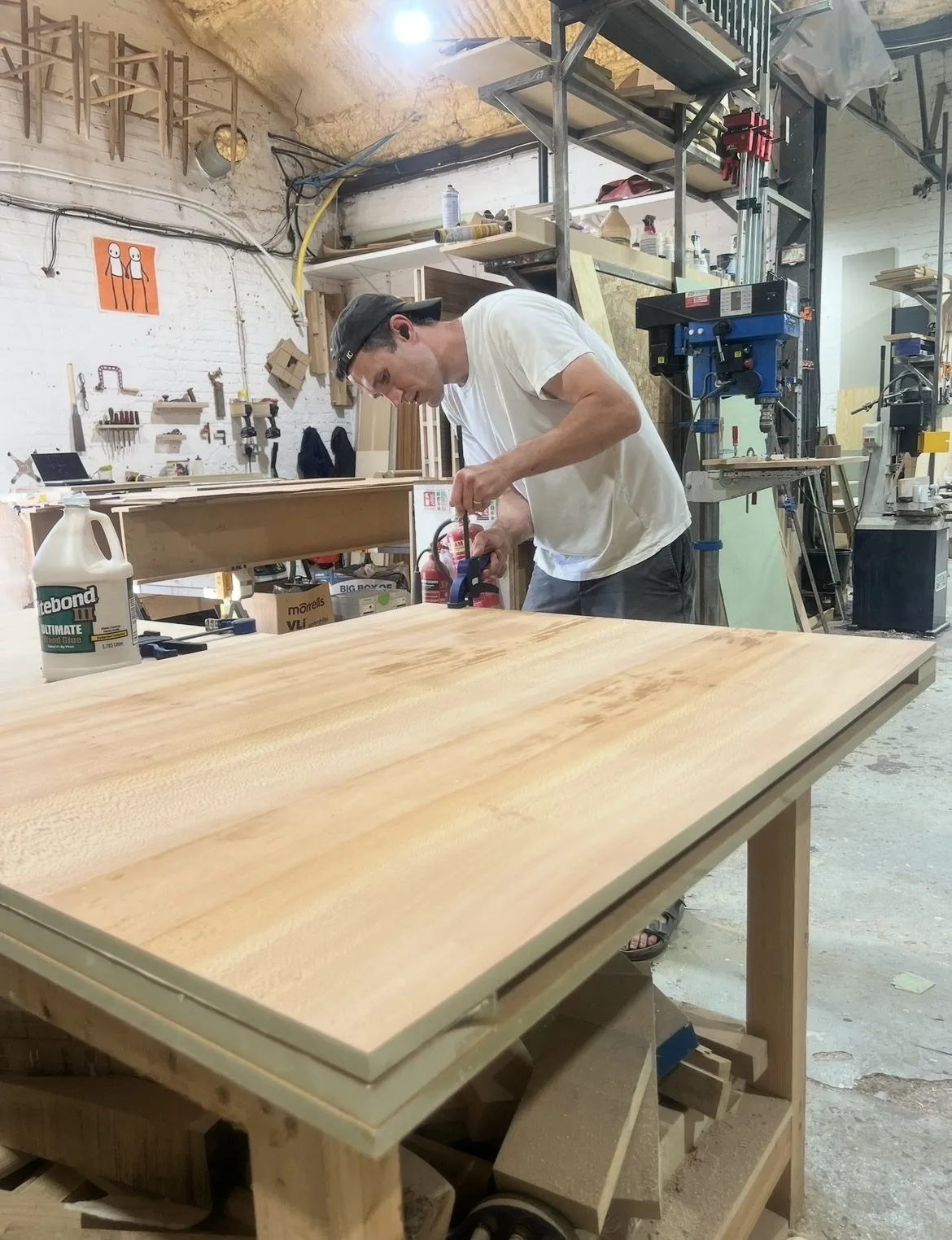 A member planing a table top